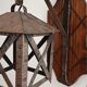 Wall lamp in wrought iron and old wood
