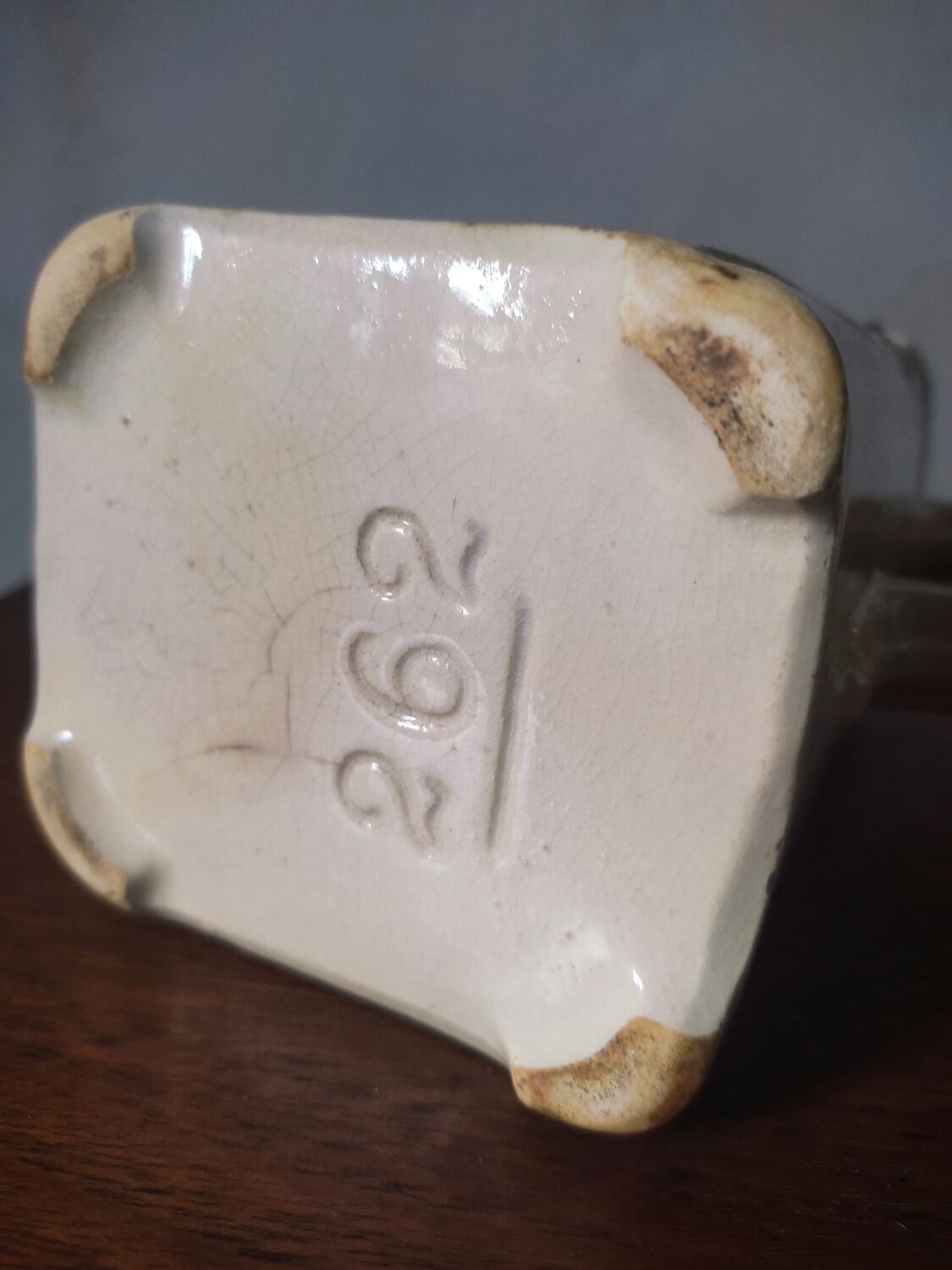 Art Nouveau pitcher in slip