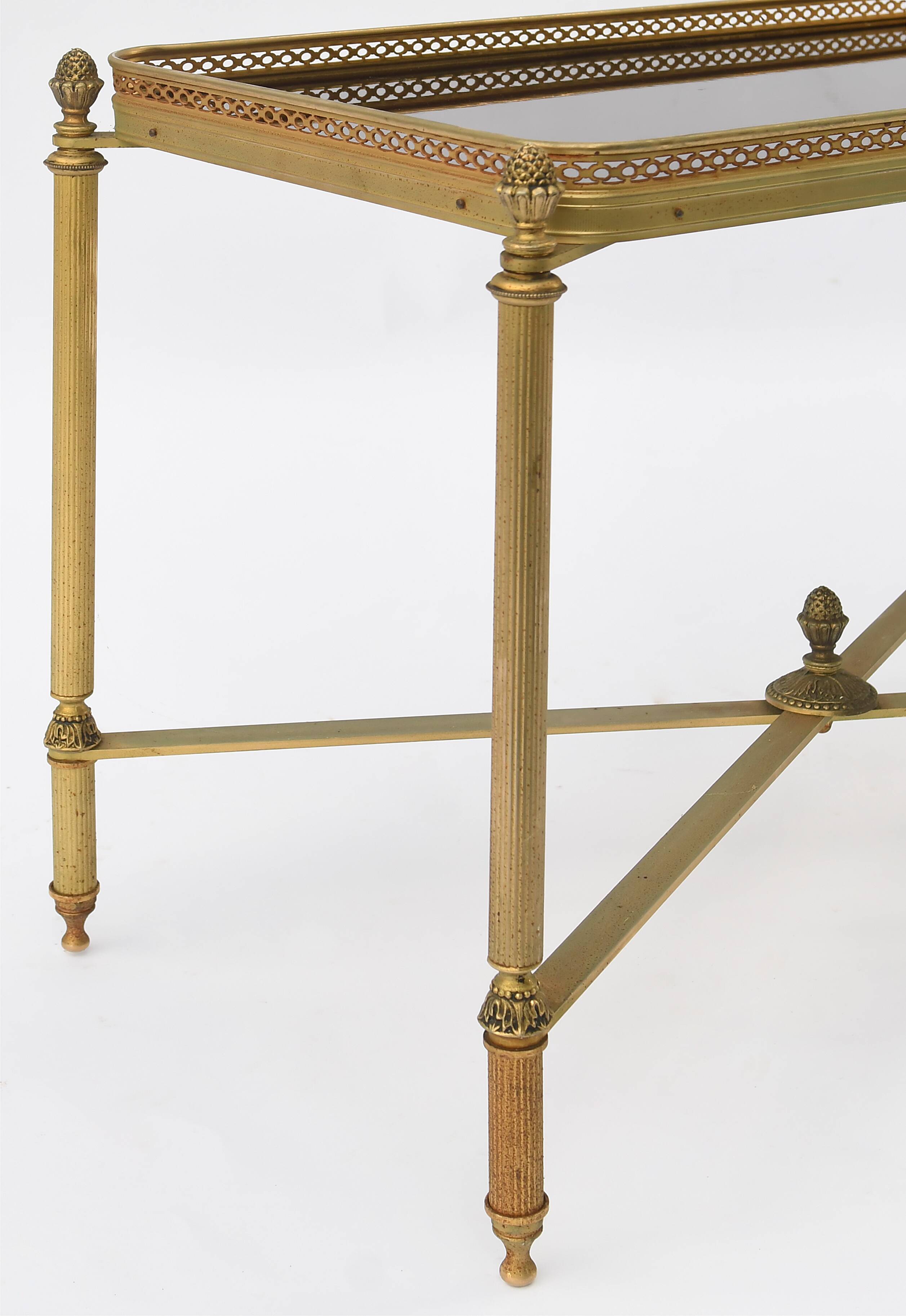 Vintage coffee table in gilded brass and formica top