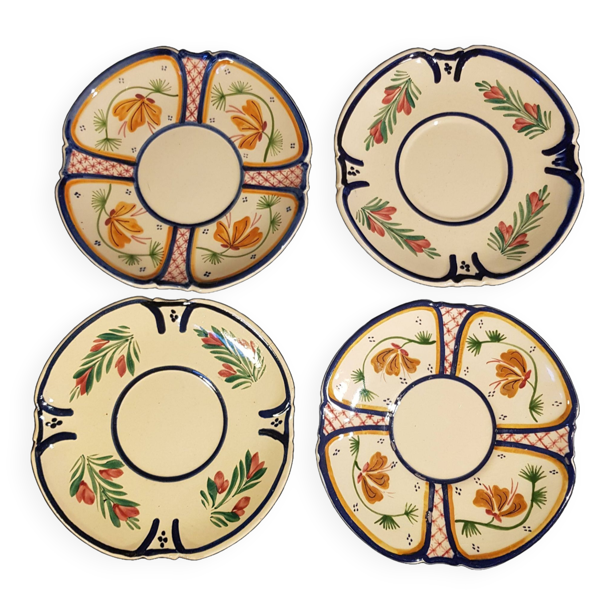 4 Quimper earthenware saucers or plates