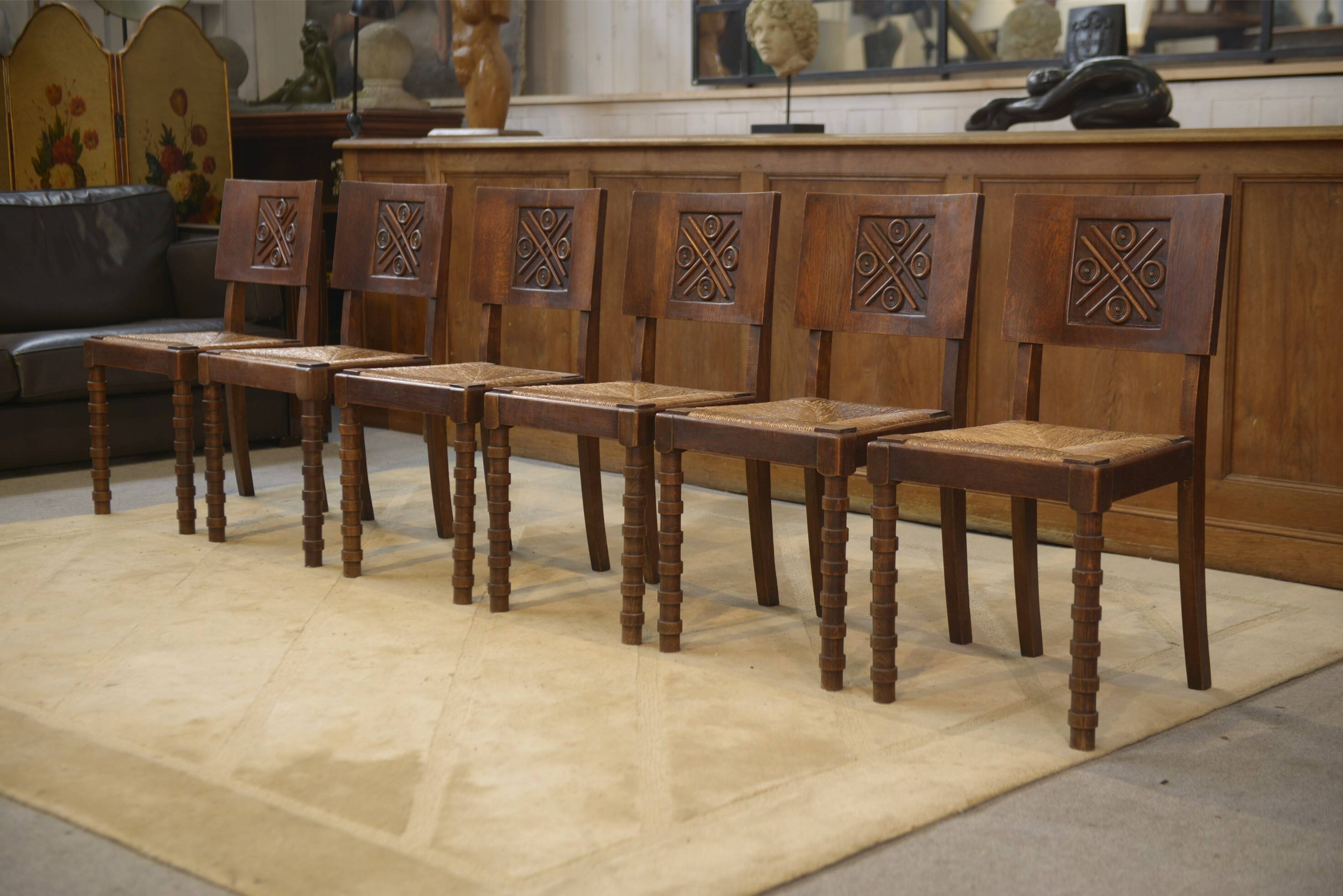Ensemble de 6 chaises Charles Dudouyt en chêne 1950’s