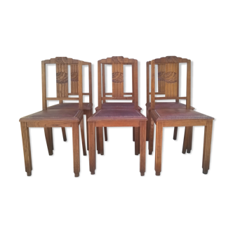 Six art deco chairs