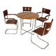 Table ronde et quatre chaises Bauhaus en acier tubulaire restaurées par M. Stam, années 1930