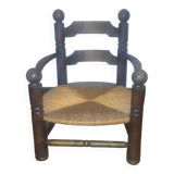 Low oak and straw armchair 1940