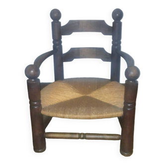 Low oak and straw armchair 1940