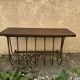 Old iron and wood console measures approximately: height 45 cm length 80 cm, depth 30.5 cm