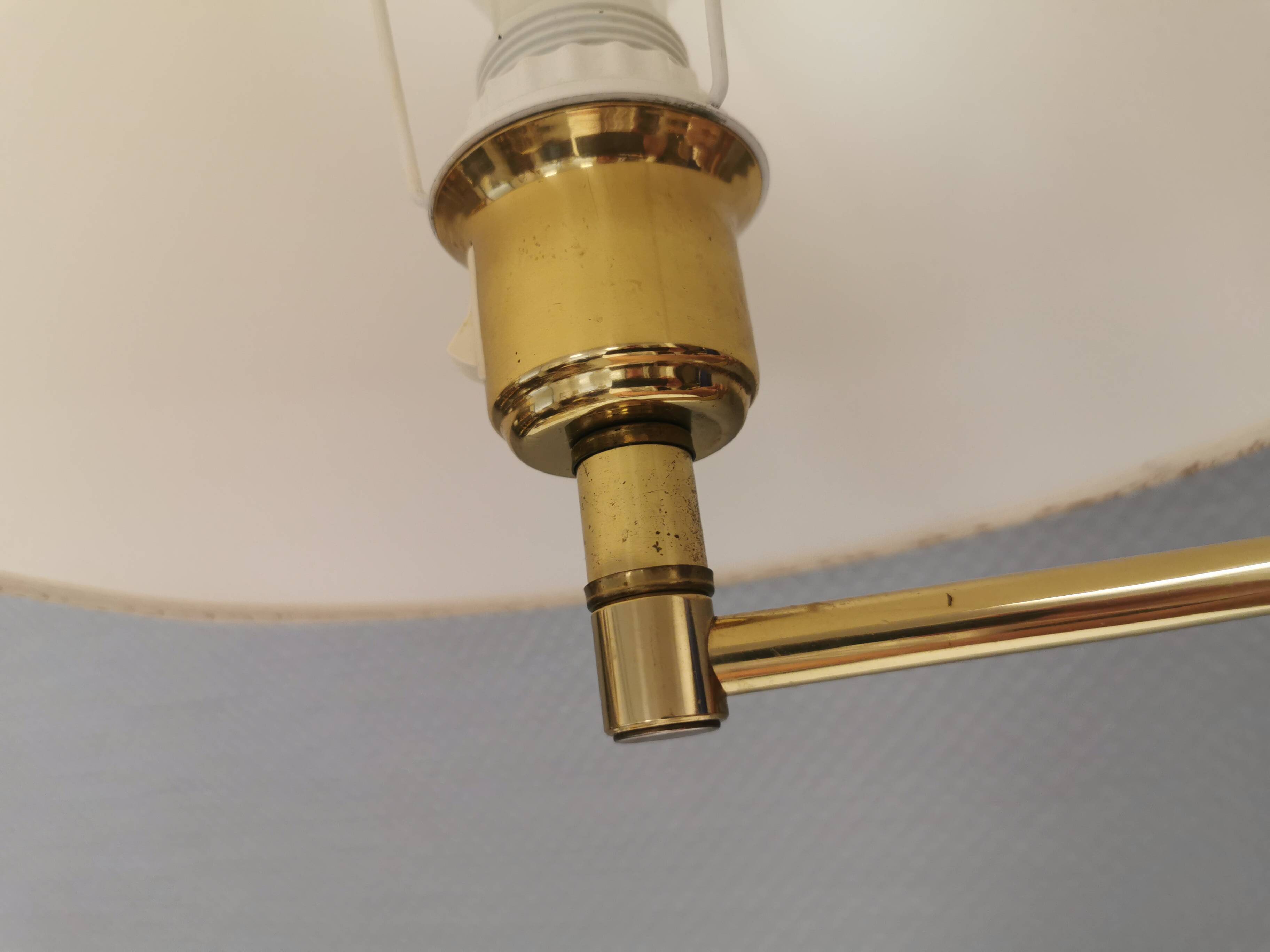 Danish Brass wall lamp with a ‘swivel’ effect.