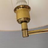Danish Brass wall lamp with a ‘swivel’ effect.