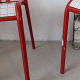 Set of 4 modernist red metal chairs