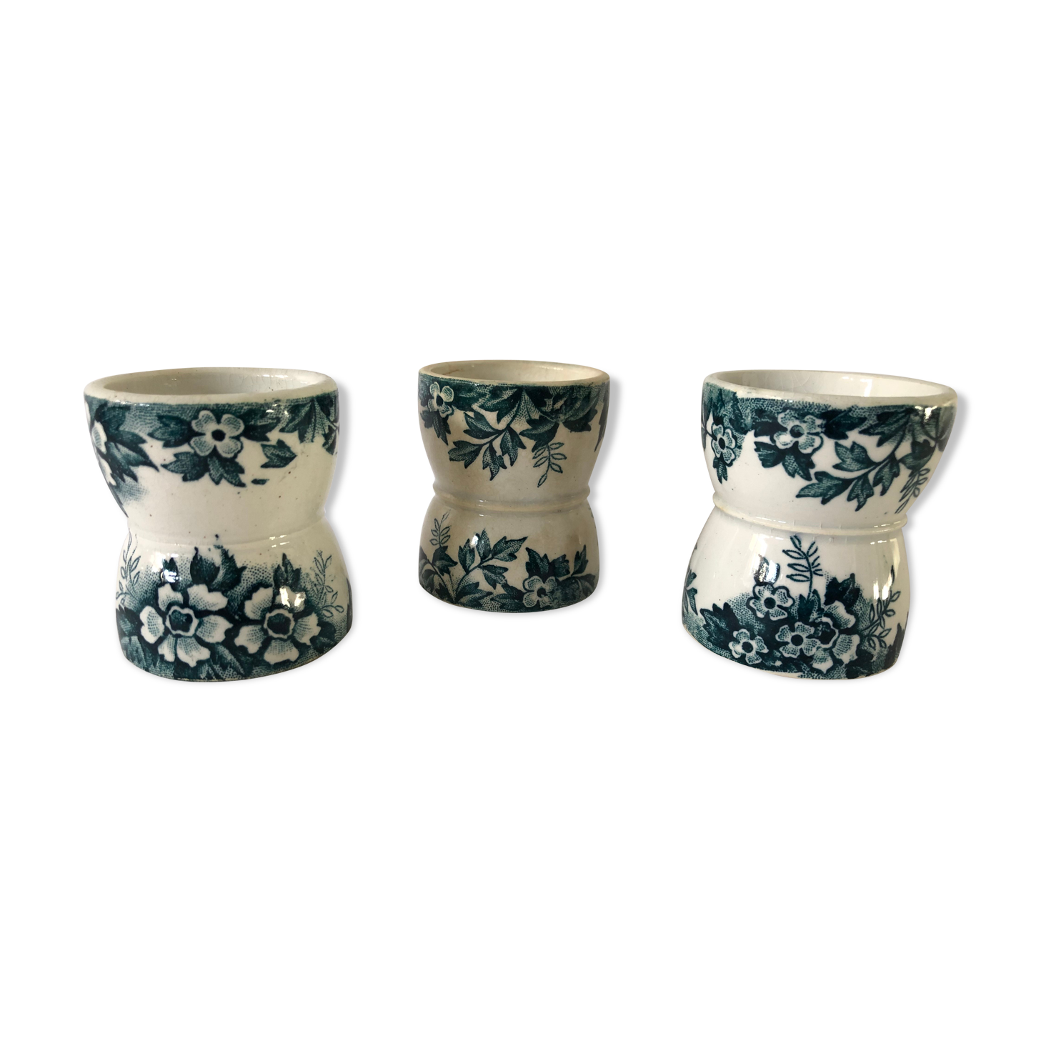 Trio of former egg cups earthenware