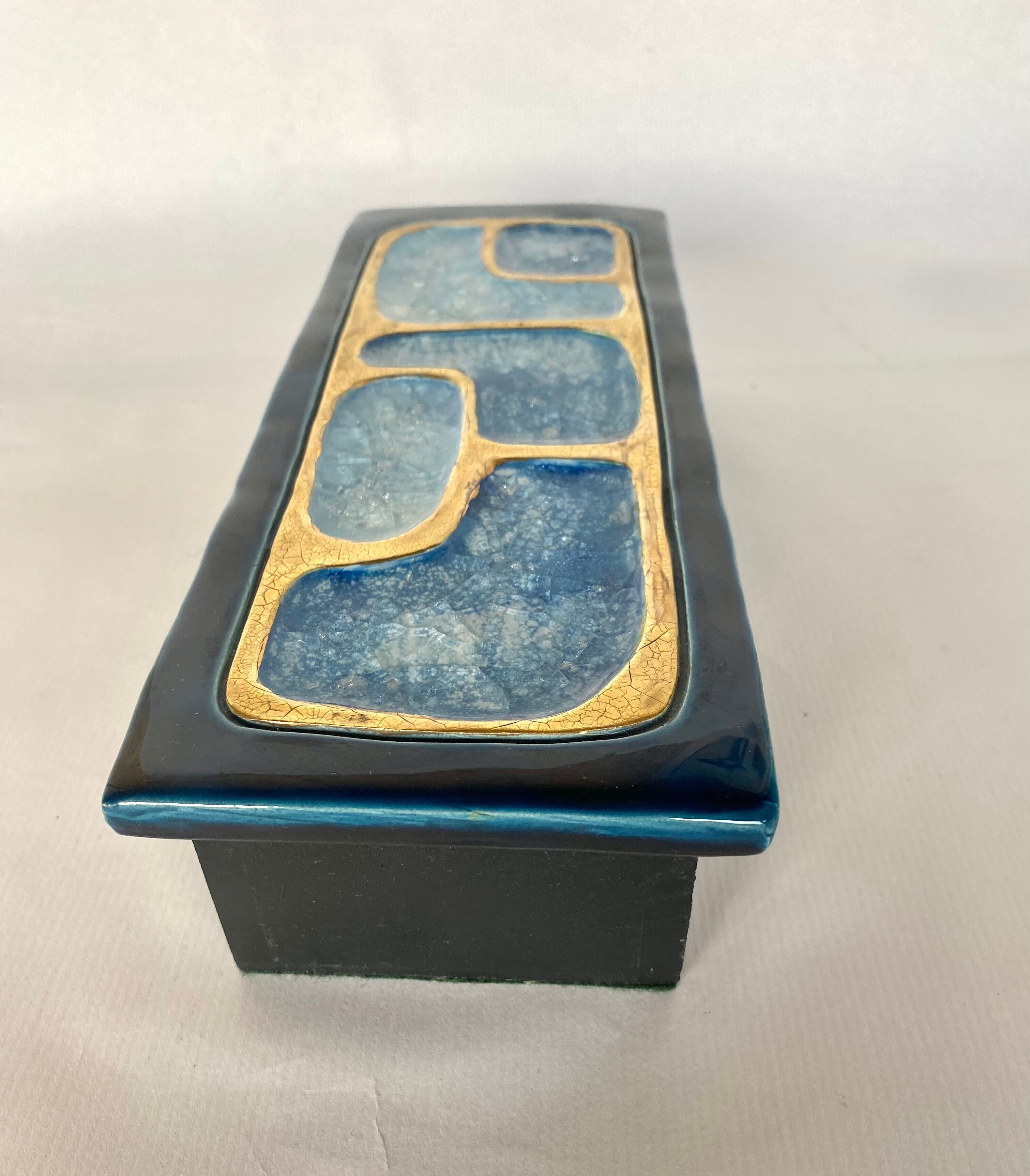 Box of Mithé Espelt ceramics, wood, 60s
