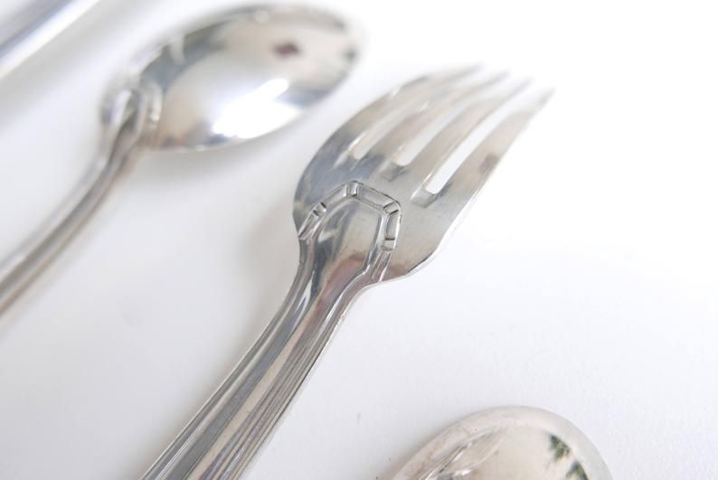 37 pieces cutlery setof silver metal with punches, 50s