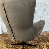 Swivel armchair in velvet fabric and metal