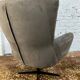 Swivel armchair in velvet fabric and metal