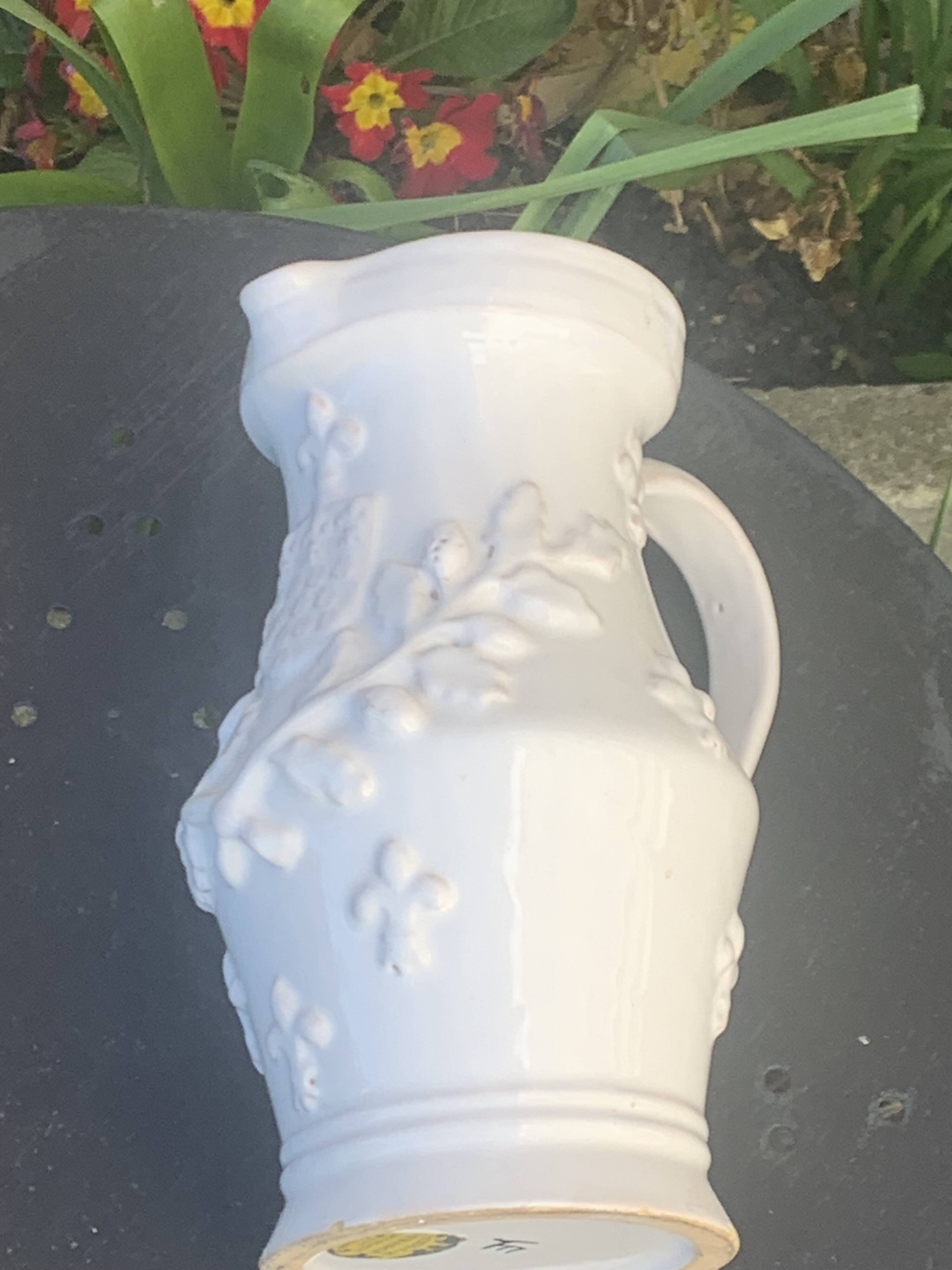 Carafe, pitcher signed Émile Tessier, Old France, in slip, ceramic