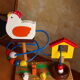 Game of awakening louping the hen and its 3 wooden chicks