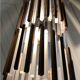 Walnut and plexiglass tube pendant light