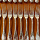Christofle France, 12 dessert knives and 12 dessert forks in new condition.