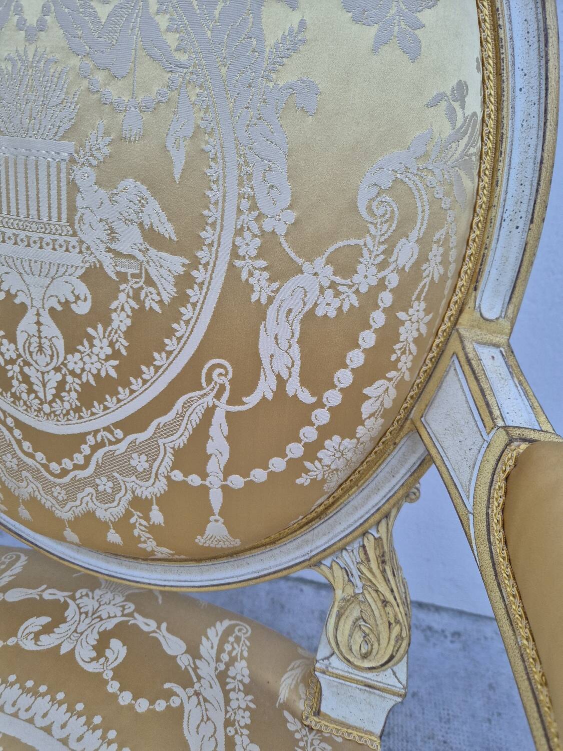 Louis XVI style cabriolet armchair with decorated medallion