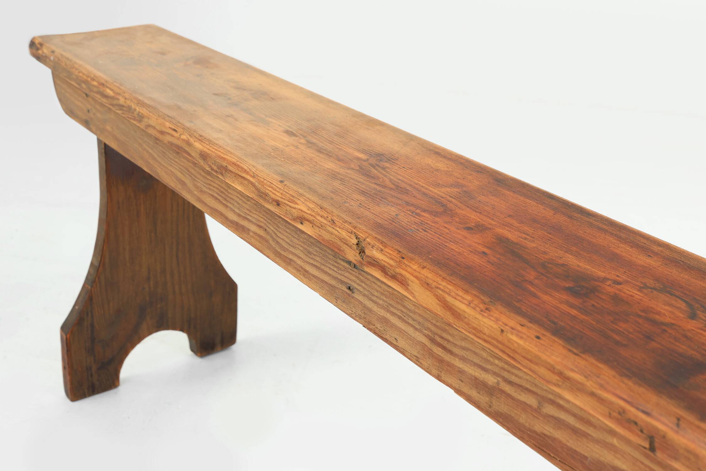 Rustic natural oak wooden bench with rounded details, France ca. 1900