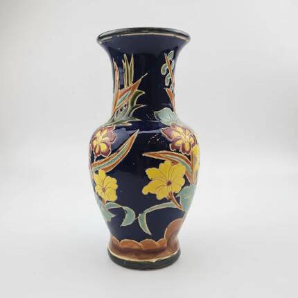 Large multicoloured ceramic vase with floral decoration signed NT.