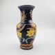 Large multicoloured ceramic vase with floral decoration signed NT.
