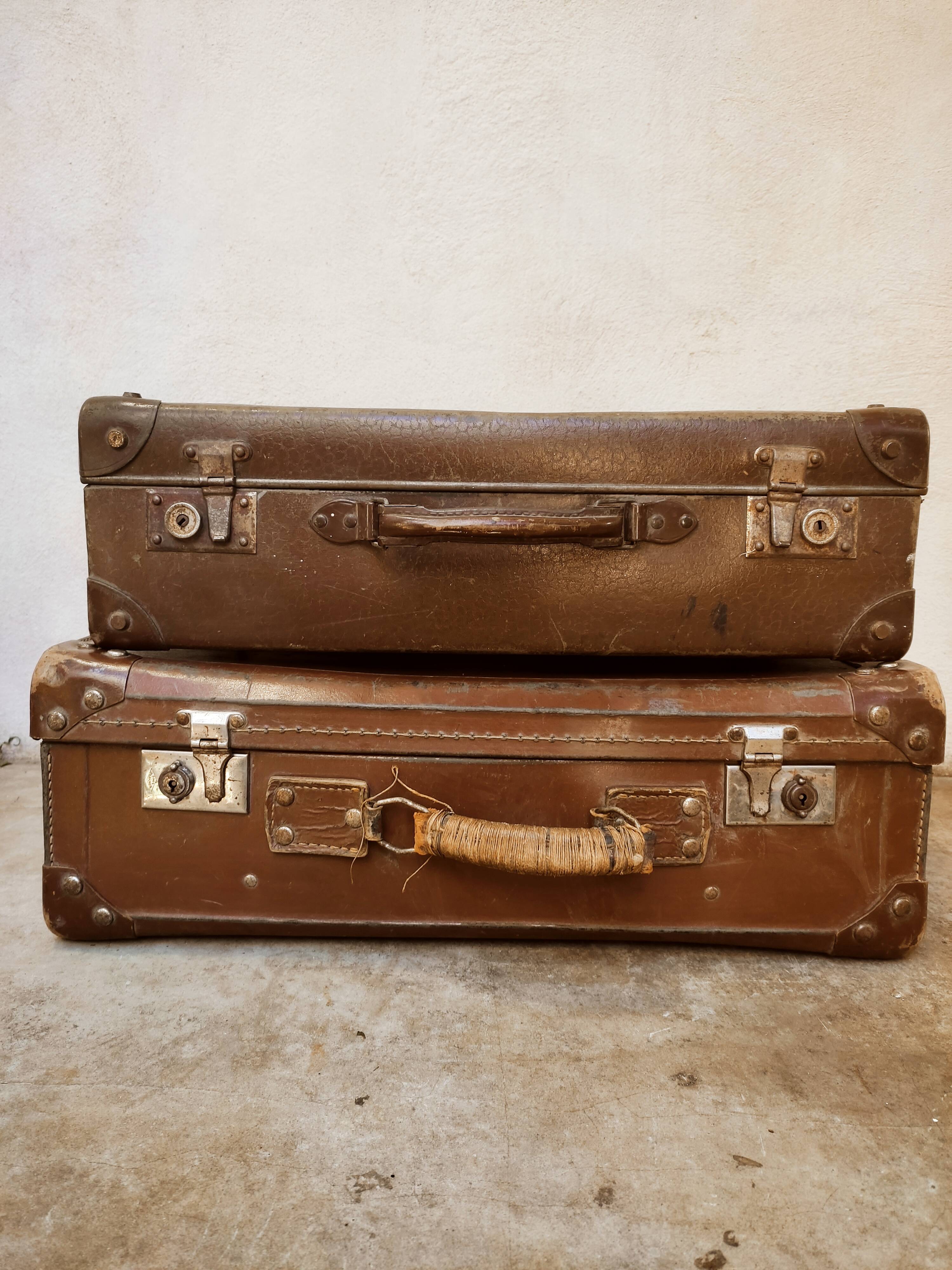 Duo of old suitcases