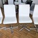 Extendable round table in white formica and 4 matching chairs by Roche Bobois.