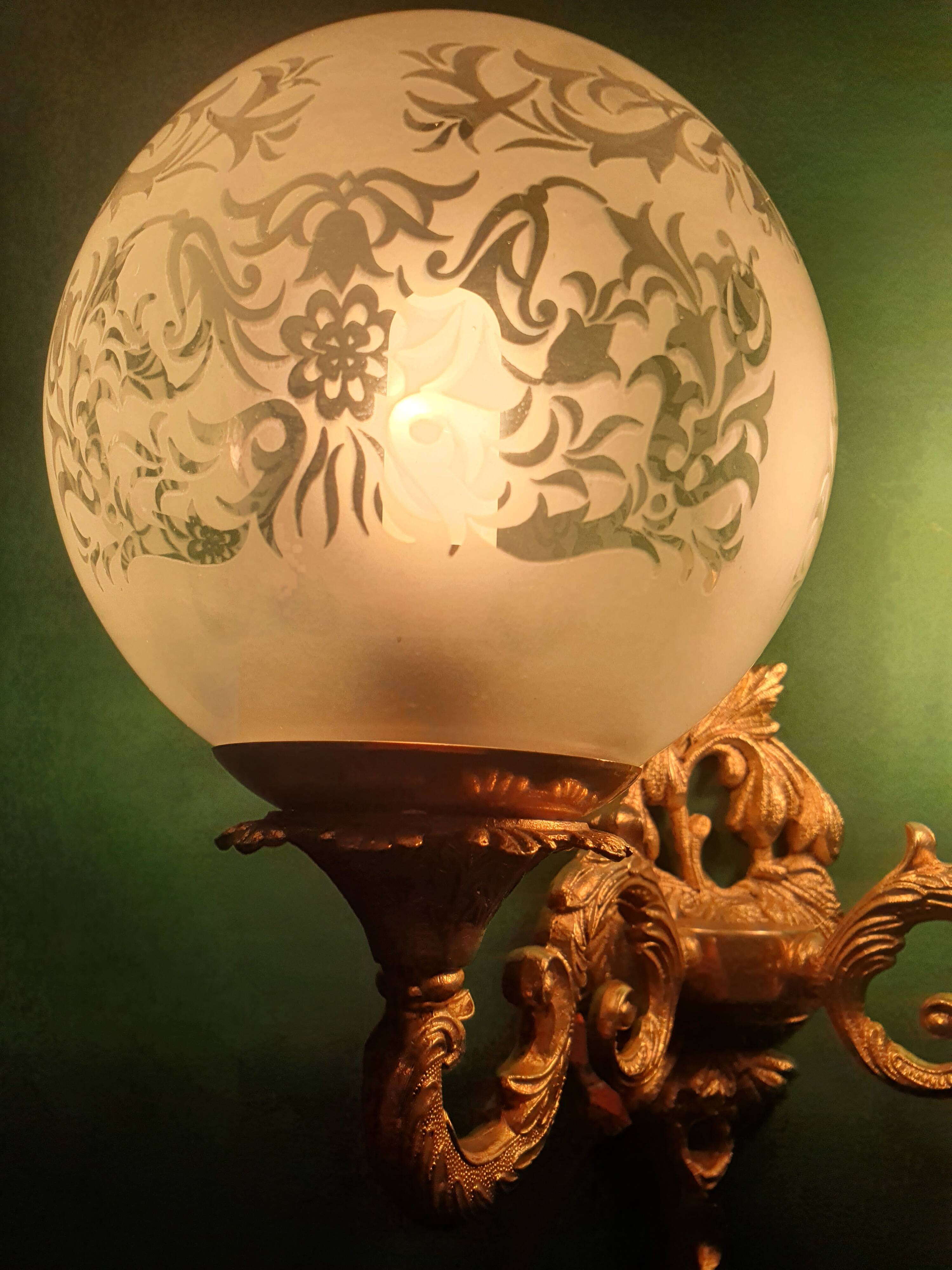 Pair of large double-light wall sconces in vintage brass and glass