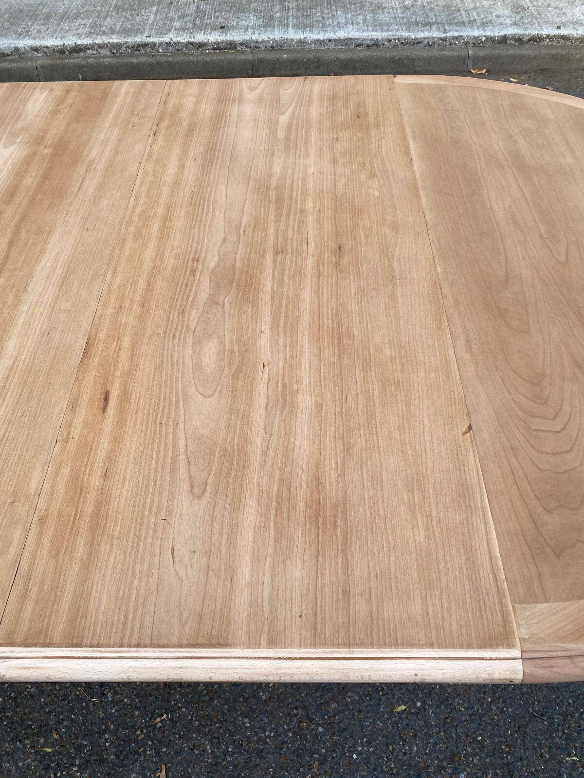 Large extendable round dining table stripped with a central wooden leg 110-198cm.