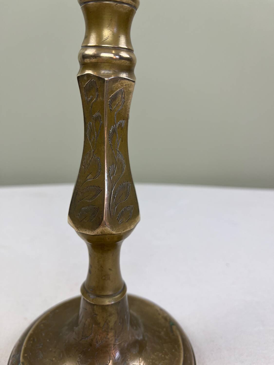 Engraved brass candle holder
