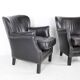 Pair of small leather club armchairs