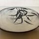 Large signed ceramic catchall.