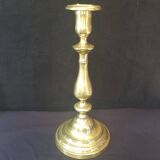 Chiseled gilded metal candlesticks