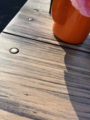 Old table with patinated green legs