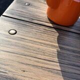 Old table with patinated green legs