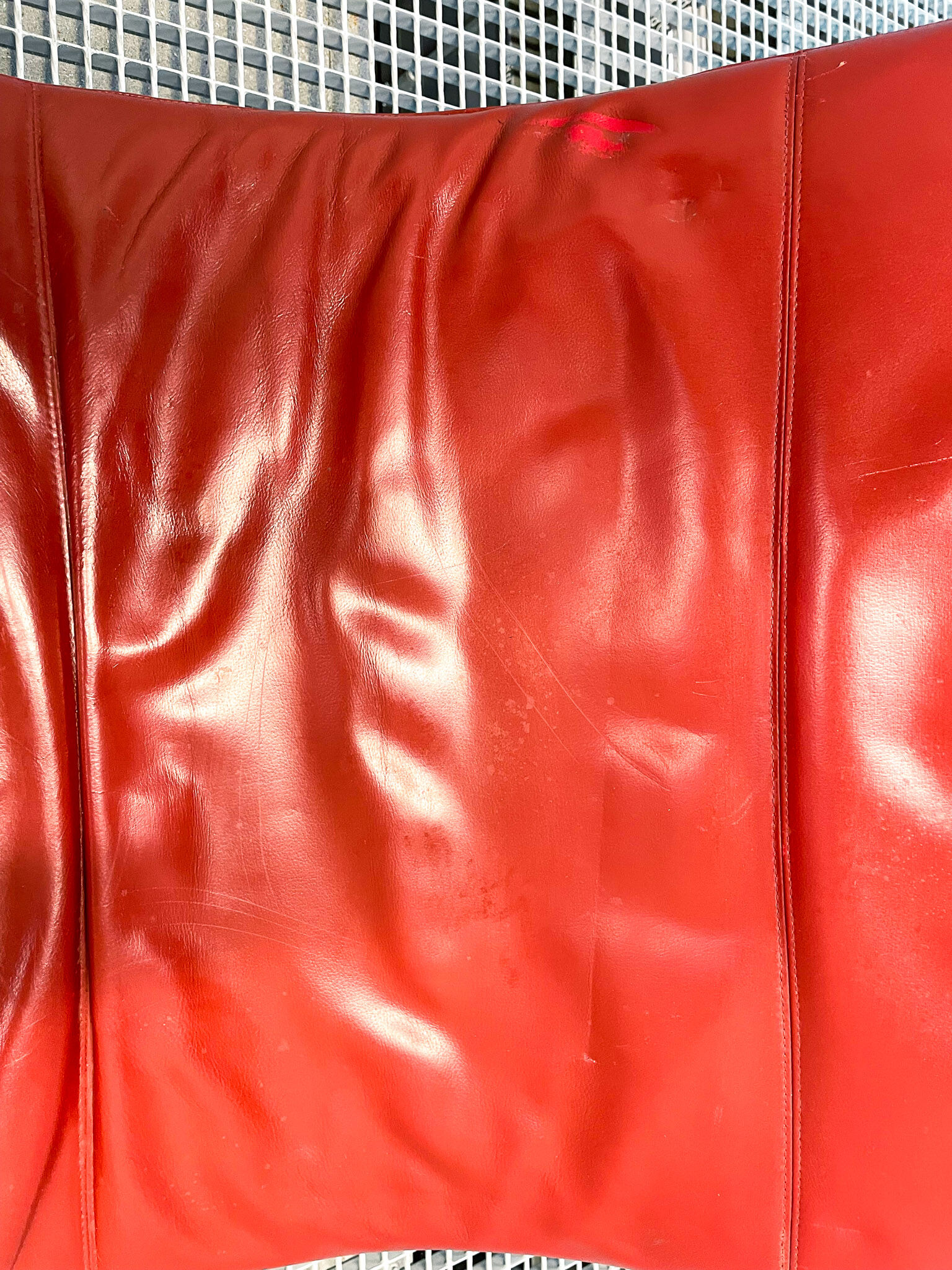 B&B Italia red leather lounge chair by Jeffrey Bernett