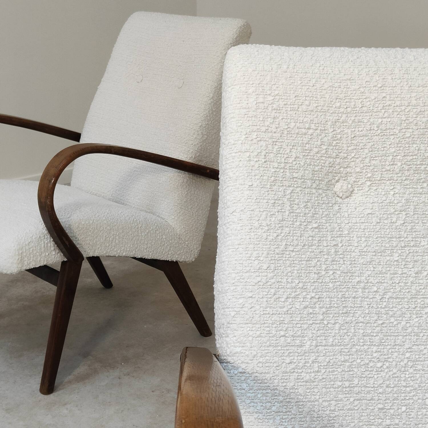 Pair of Jaroslav Smidek armchairs for Ton Bystrice, restored with white boucle, 1960.