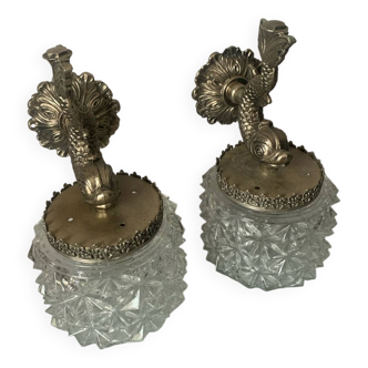 Pair of 1950s dolphin wall lights in silver-plated bronze and diamond-cut glass
