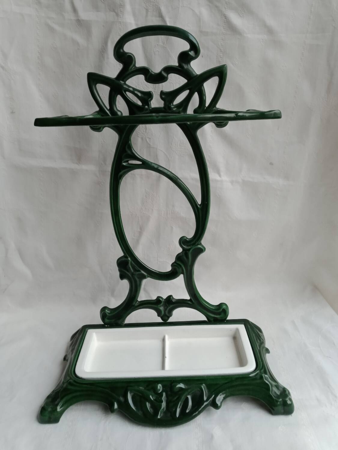 Art Nouveau style cast iron umbrella stand