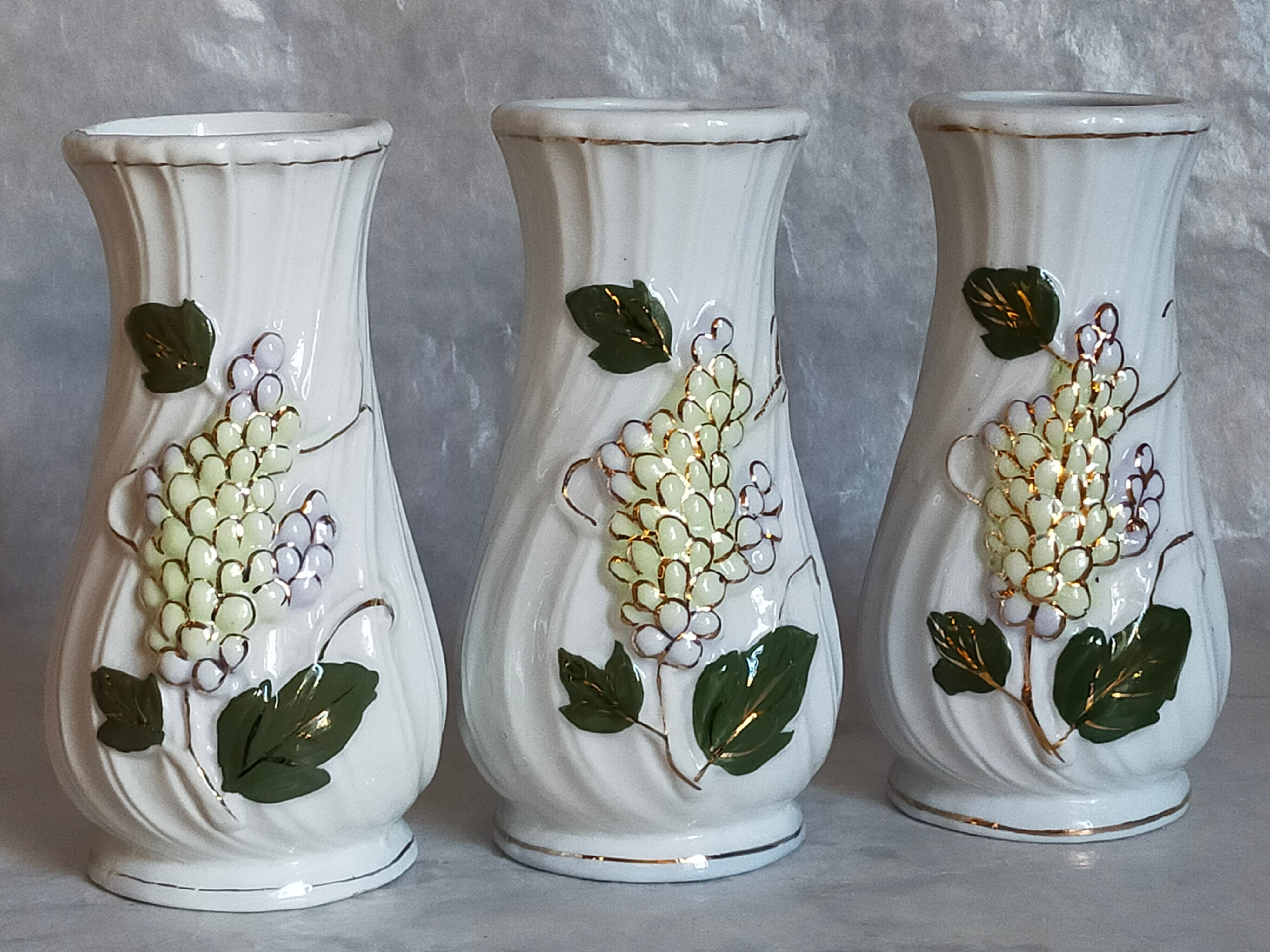 Three ancient lilac slurry vases