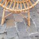 Pairs of shell rattan armchairs from the 50
