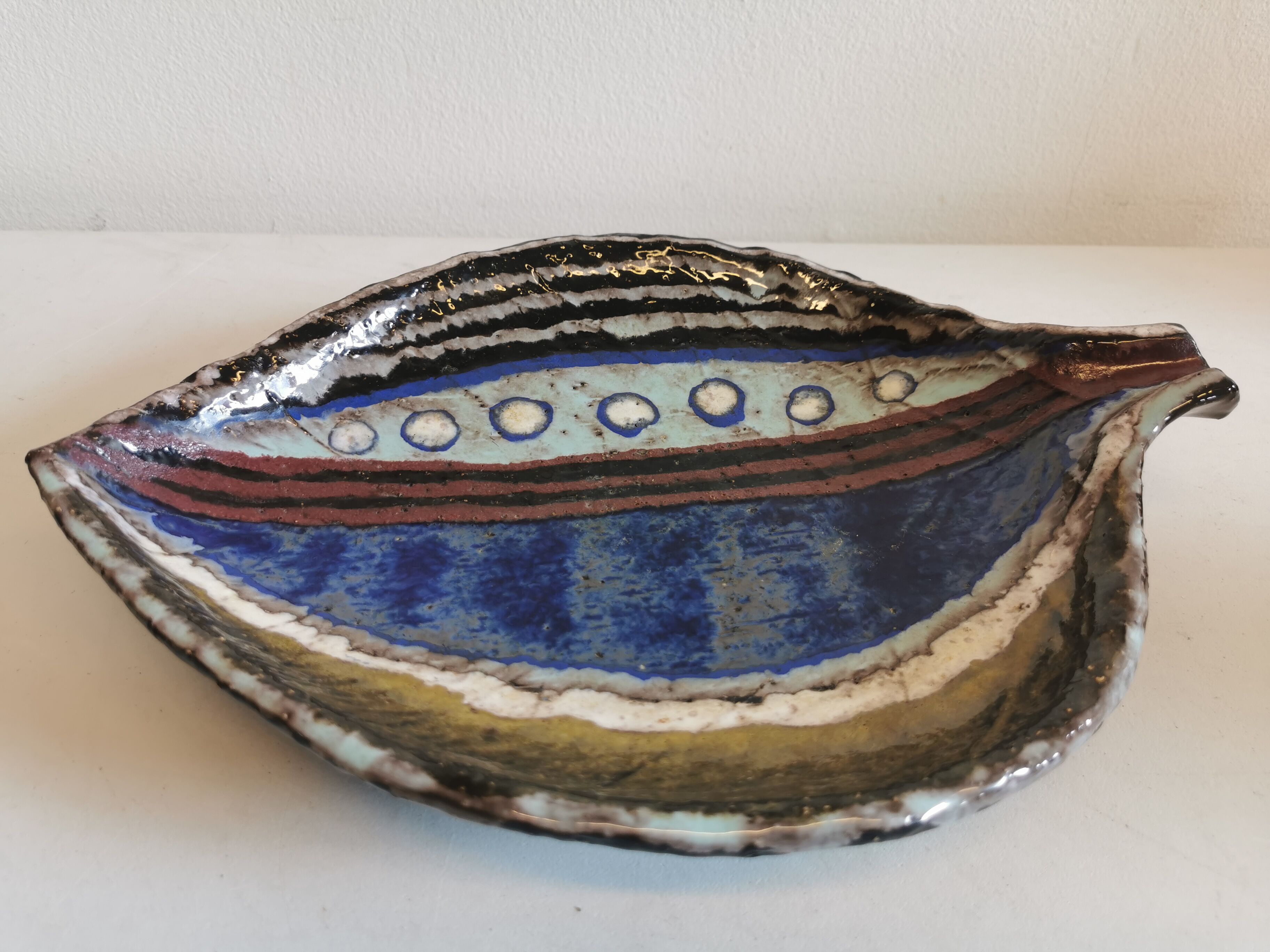 Danish ceramic dish shaped like a leaf.