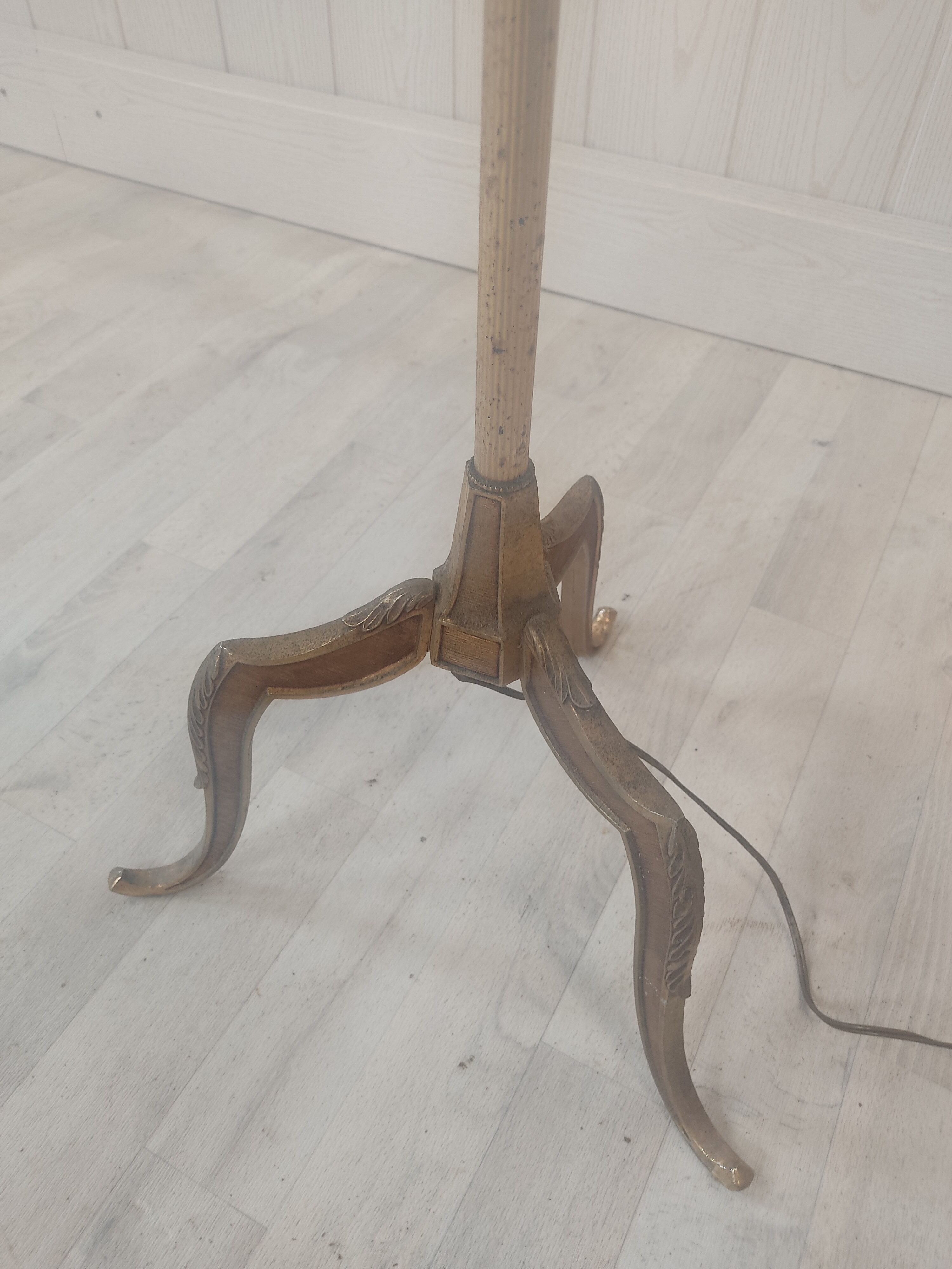 Gilded metal tripod floor lamp