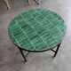 Round coffee table in emerald green zellige – Moroccan craftsmanship