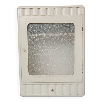 Old wall cabinet with one door and one drawer