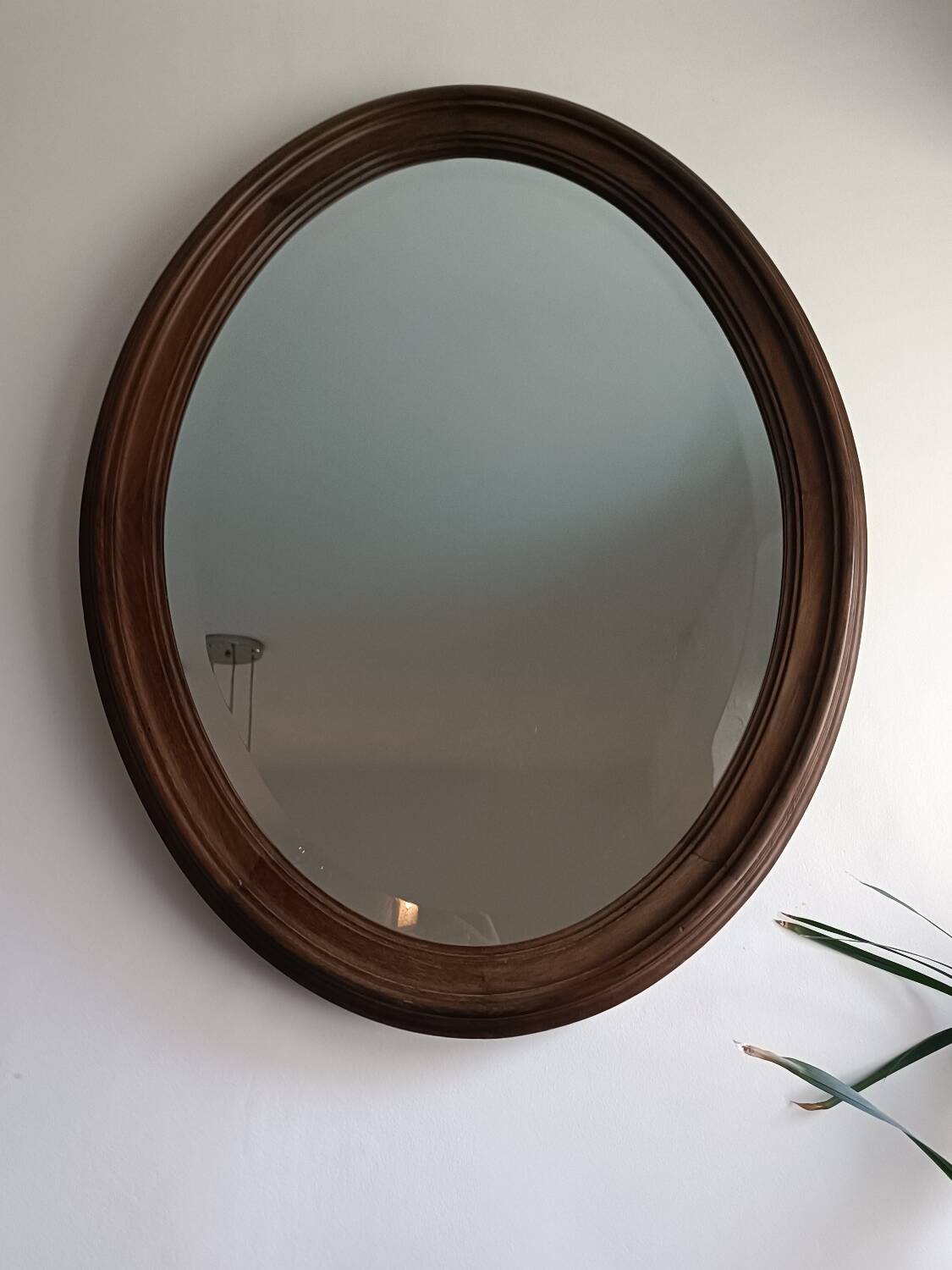 Antique oval beveled mirror