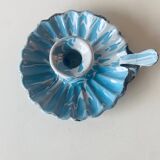 Old blue enameled metal candle holder