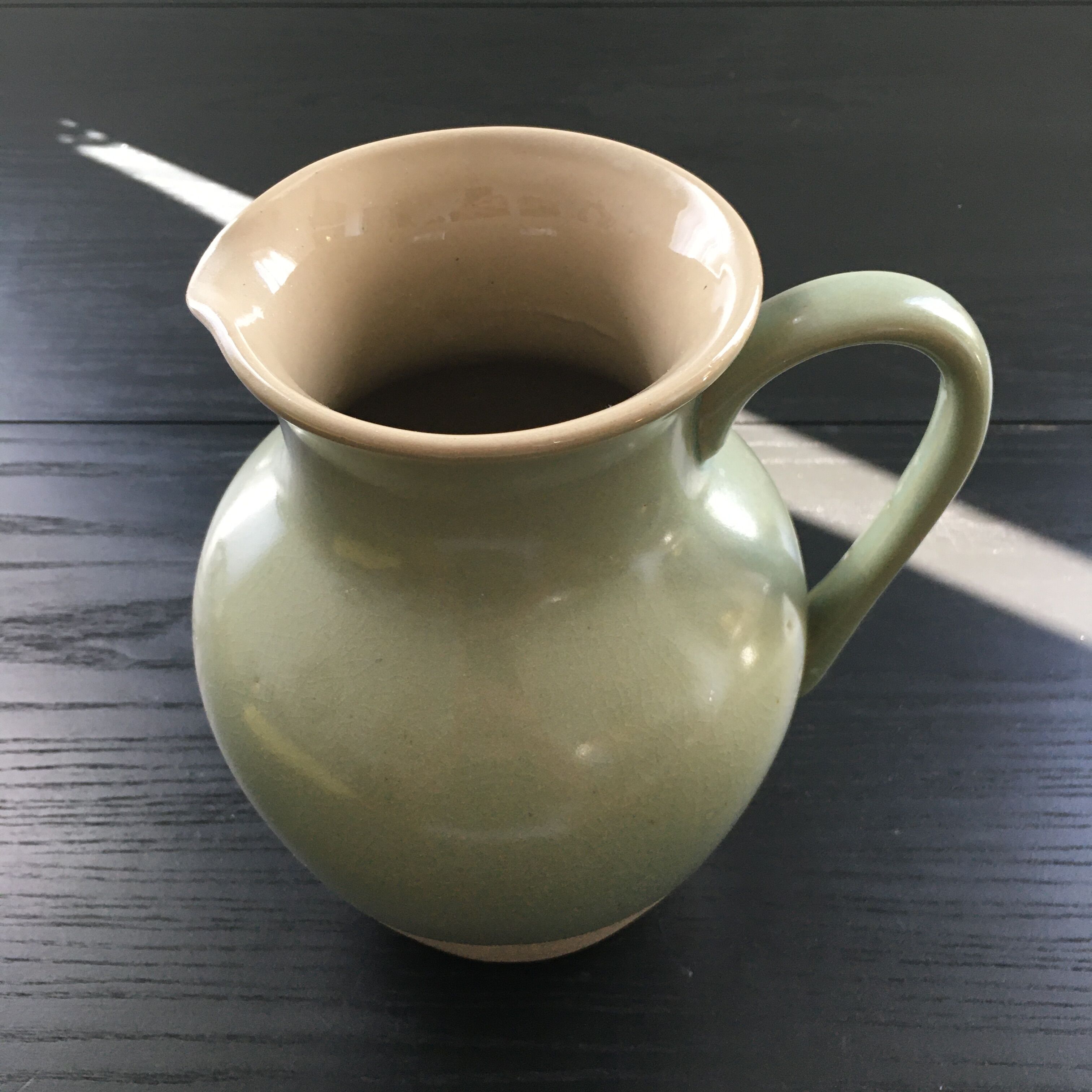 Two-tone almond green pitcher