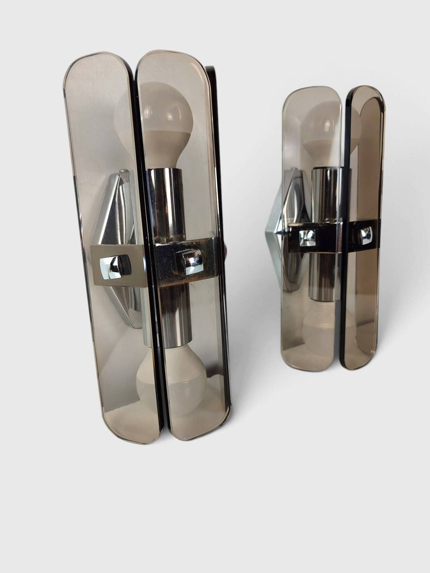 Pair of smoked glass and chrome wall lights attributed to Fontana Arte – Years